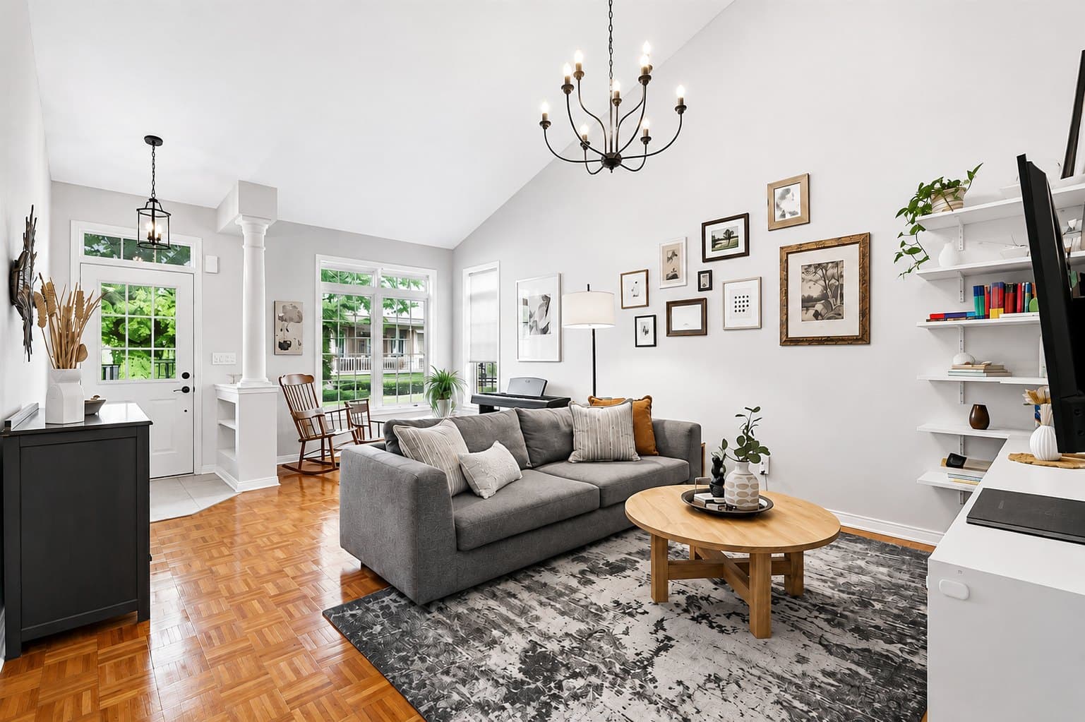 Living Room listing photo before AI furniture removal — gallery wall & piano still in the room